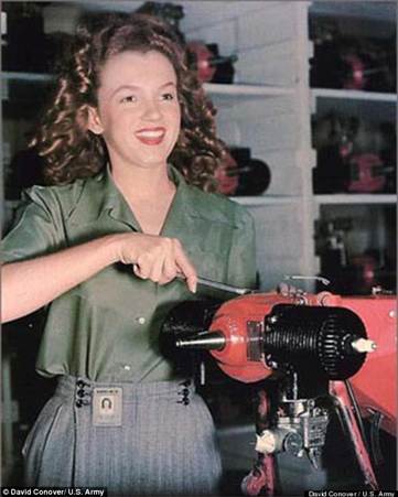 Norma Jeane Dougherty (Marilyn Monroe) working on factory machinery during WWII.