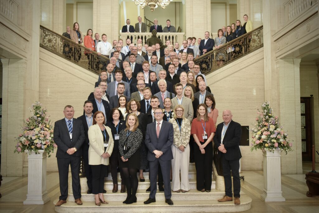Image of attendees, on a grand marble staircase